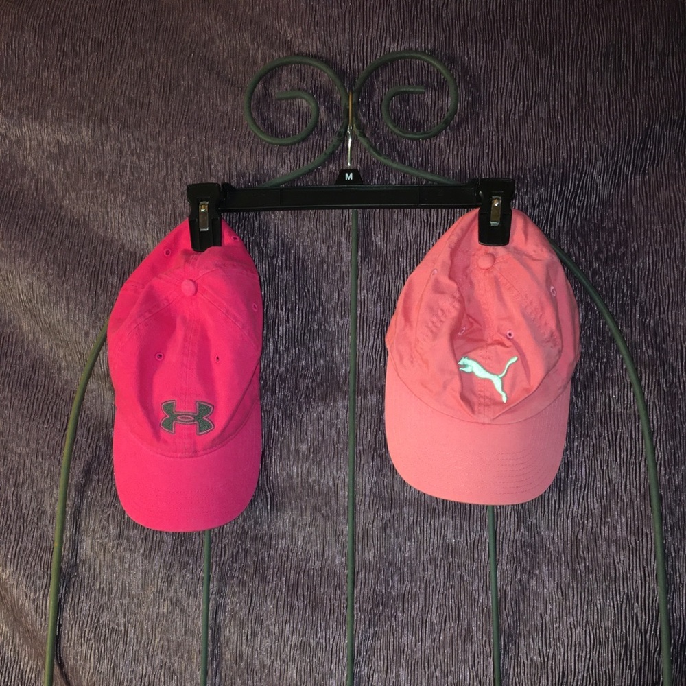 Pink Under Armour and Puma hats